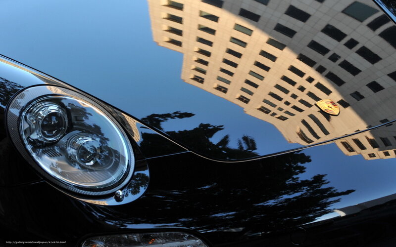 Porsche reflection on car hood