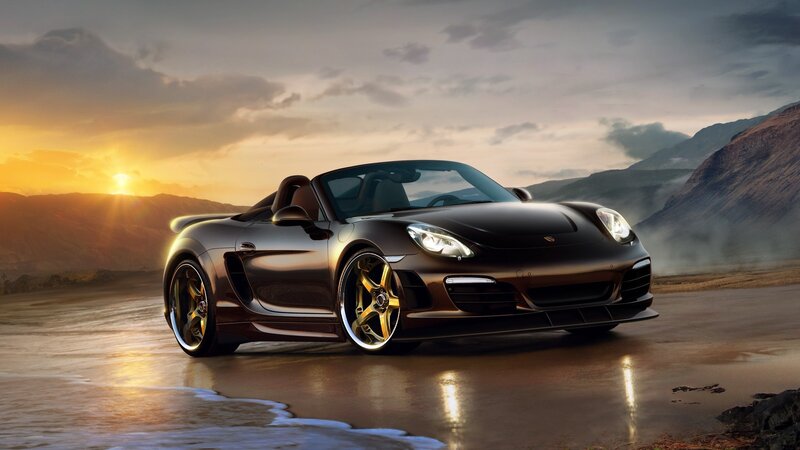 Porsche sports car at sunset