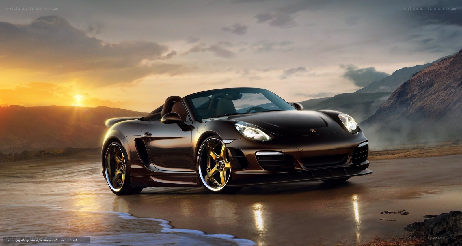 Porsche sports car on beach at sunset
