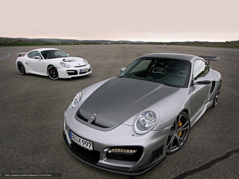Porsche sports cars on airfield