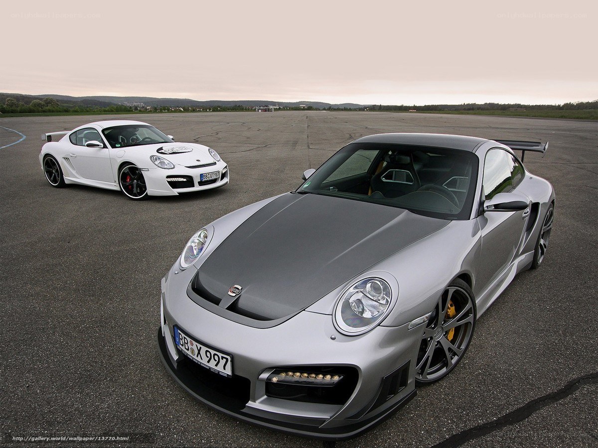 Porsche sports cars on airfield