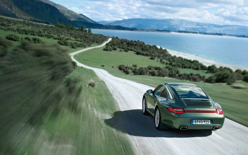 Porsche Targa driving on a scenic road