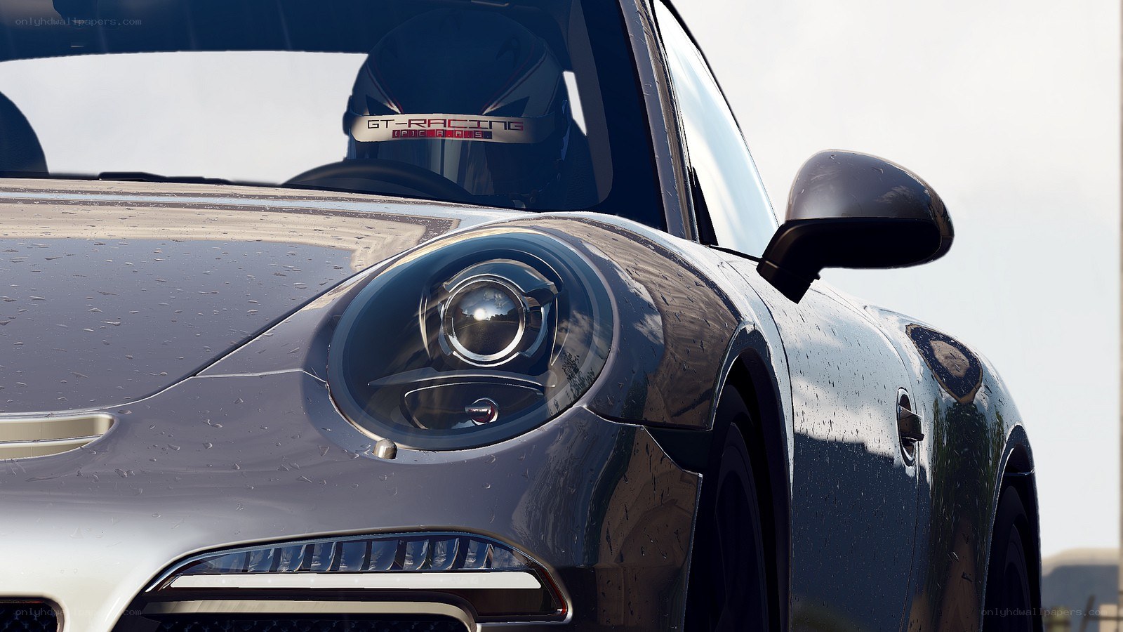 Porsche with racing helmet
