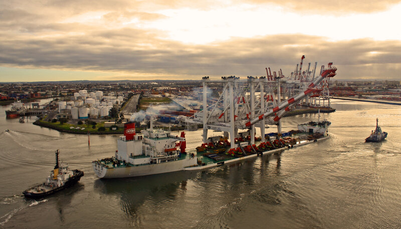 Port cargo ship with cranes