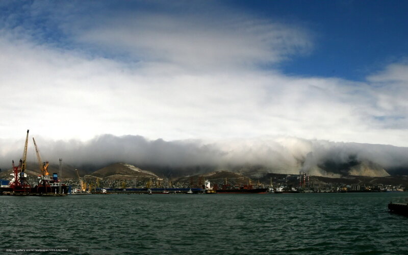 Port with fog-covered mountains