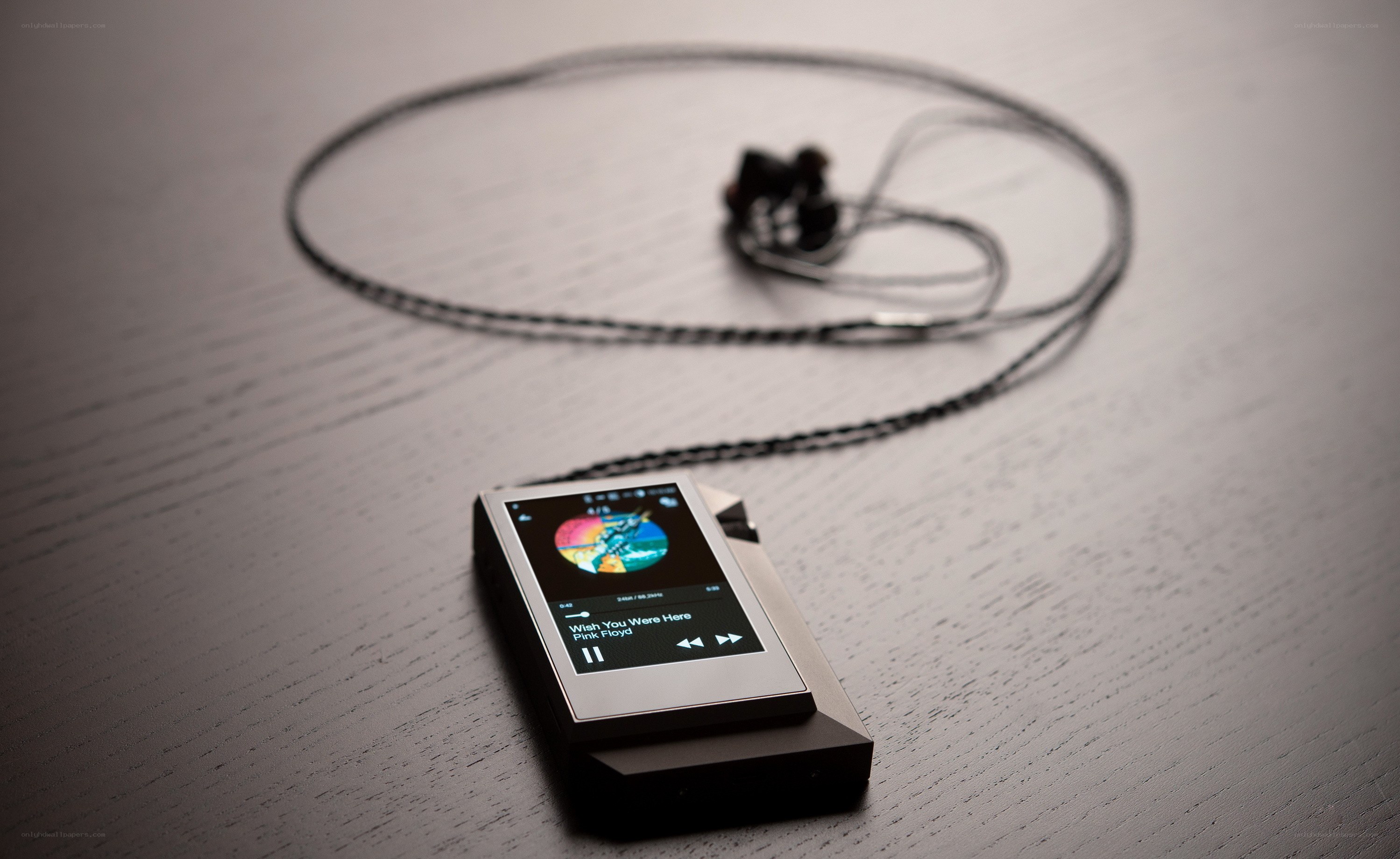 Portable music player with earbuds