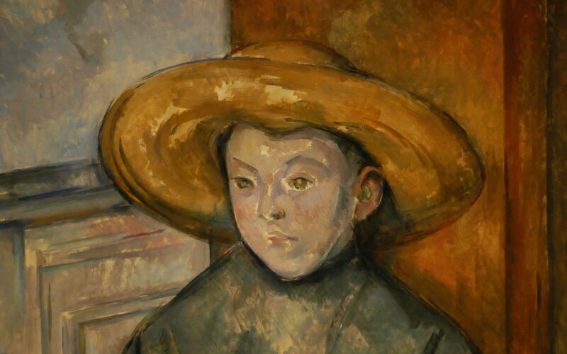 Portrait of a boy in a straw hat