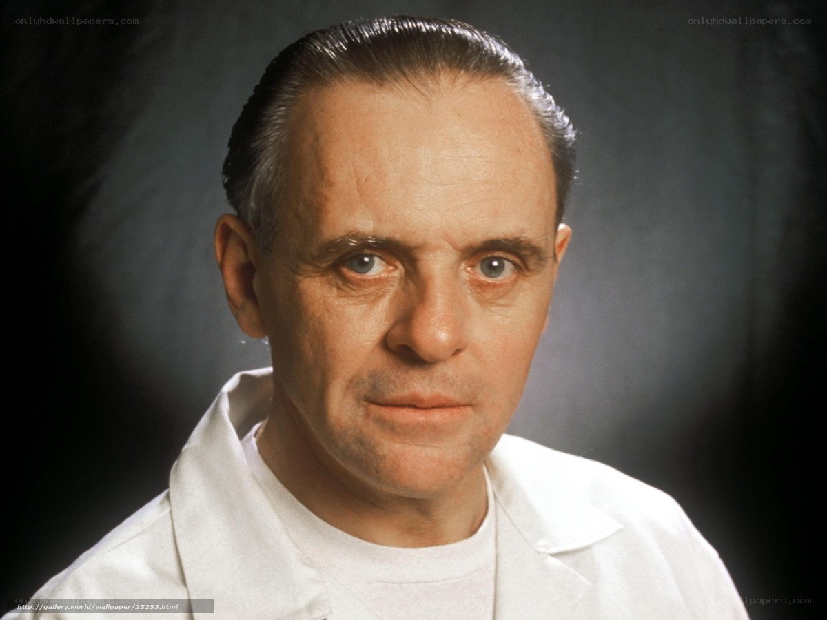 Portrait of a man in a white coat