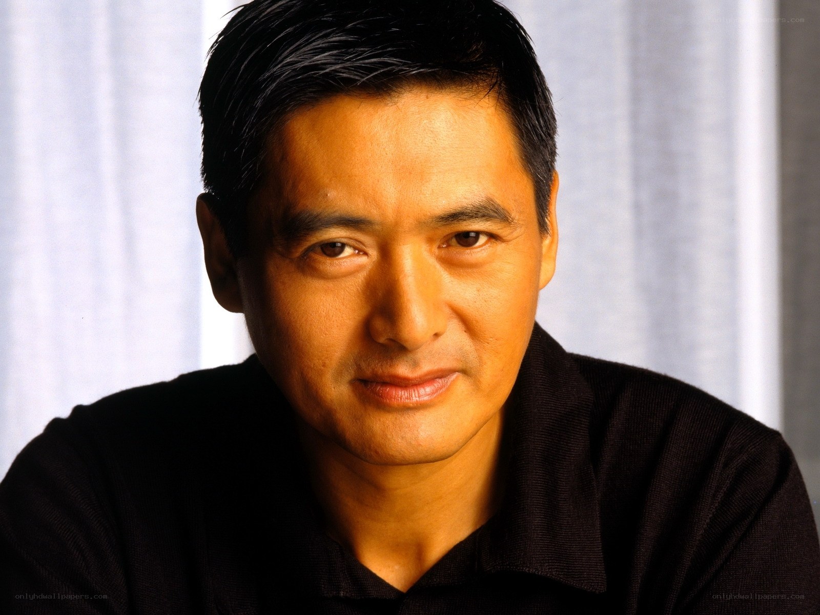 Portrait of a man in black shirt