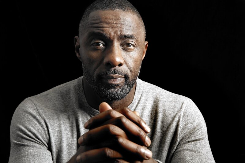 Portrait of a man in gray sweater