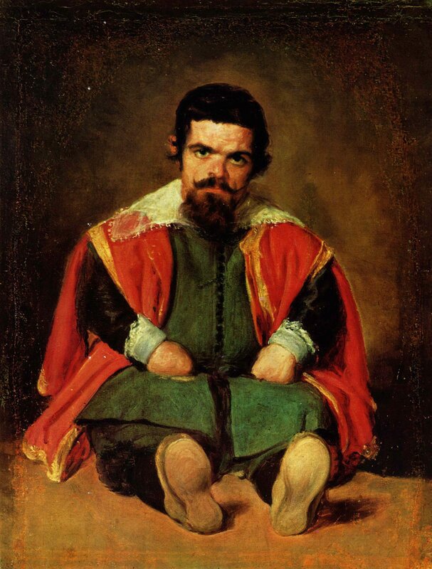 Portrait of a man in red cloak