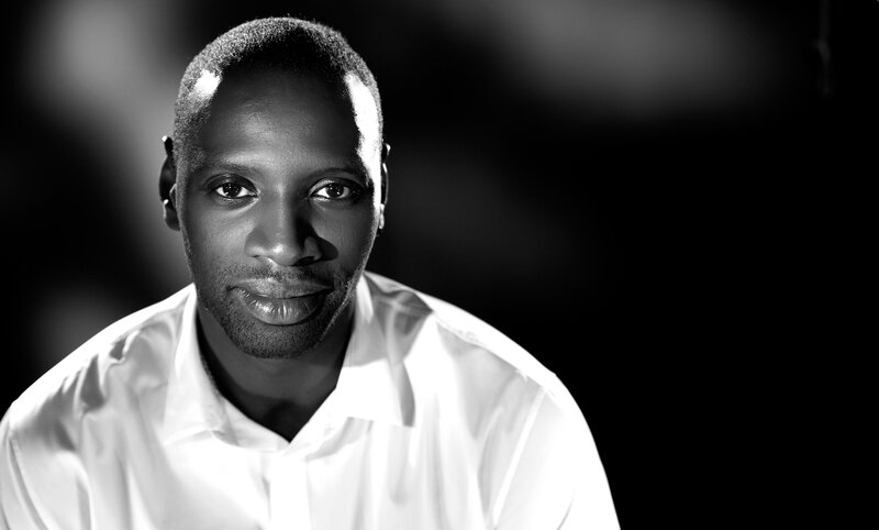 Portrait of a man in white shirt