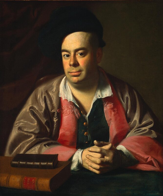 Portrait of a man with books