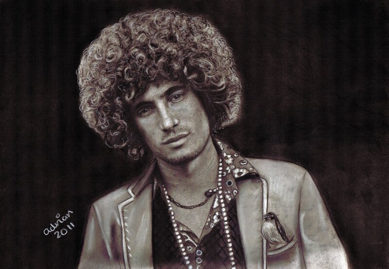 portrait of a man with curly hair