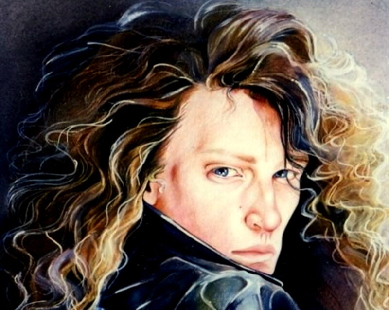 portrait of a man with curly hair