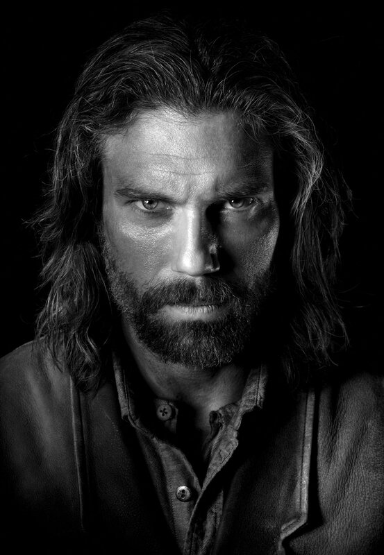 portrait of a man with long hair