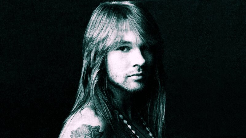 portrait of a man with long hair