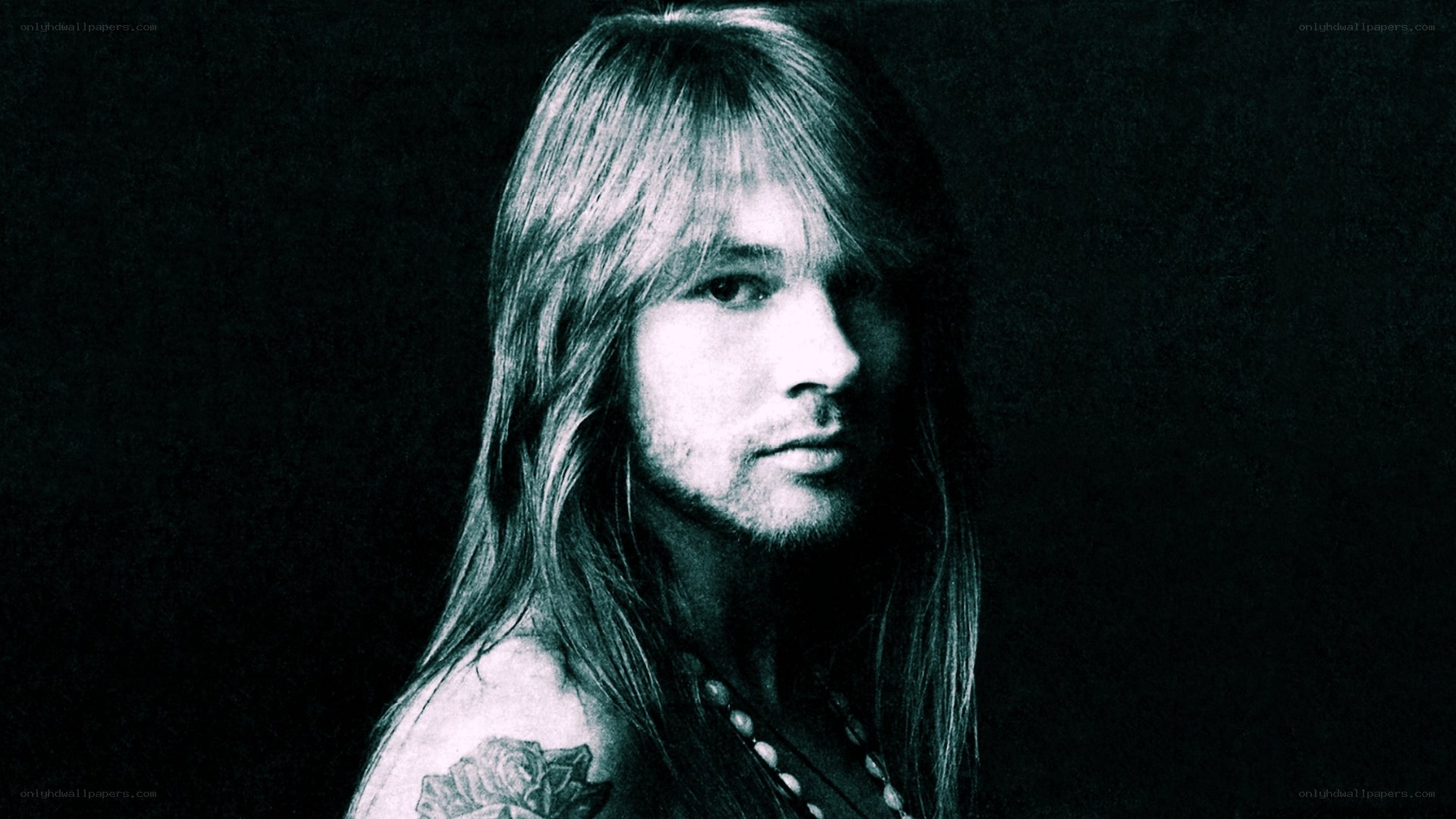 portrait of a man with long hair
