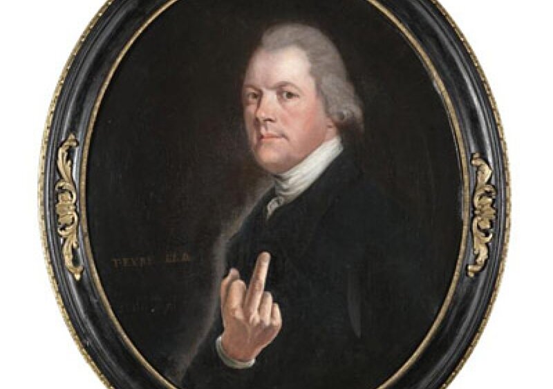 Portrait of a man with middle finger