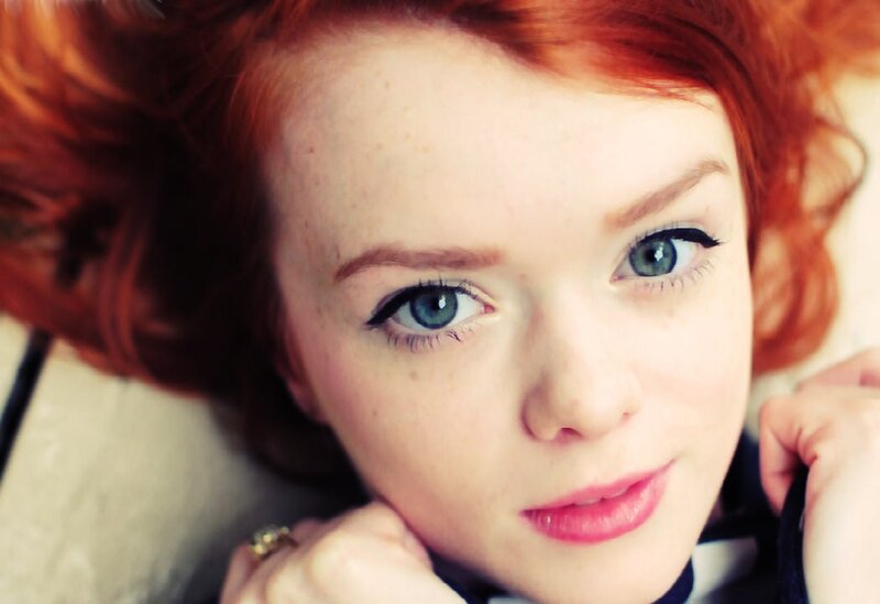 portrait of a red-haired woman