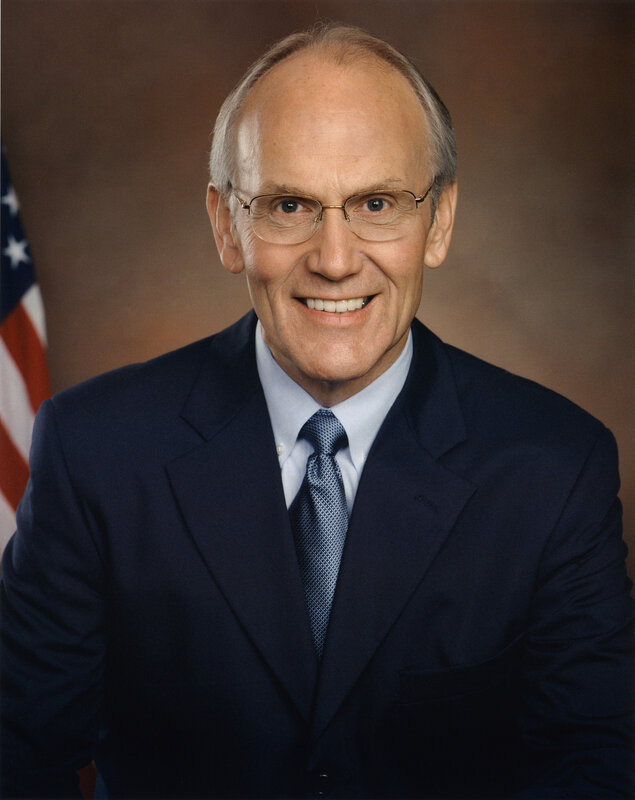 Portrait of a smiling man in suit