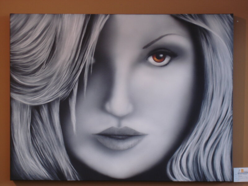portrait of a woman with one eye