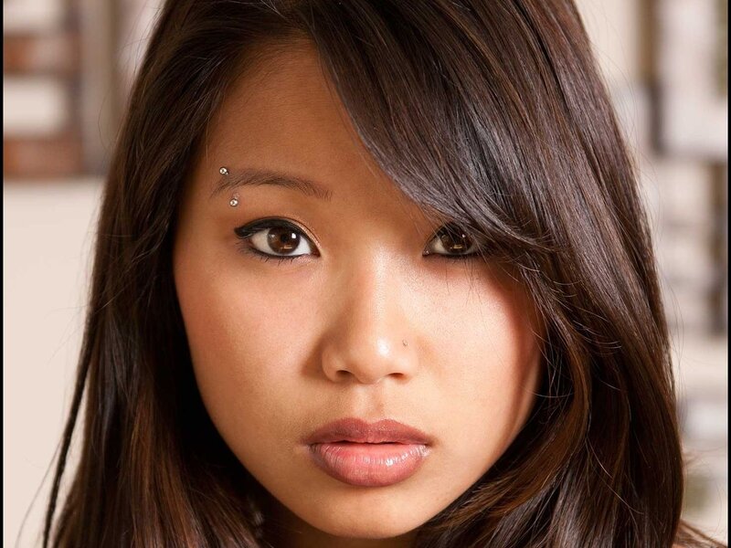 portrait of a woman with piercings