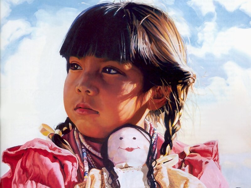 Portrait of a young girl with doll