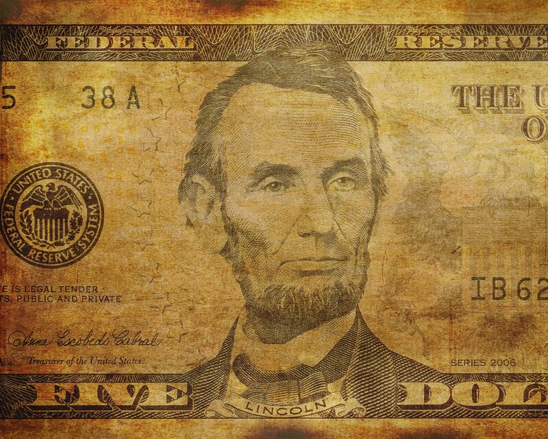Portrait of Abraham Lincoln on a five-dollar bill