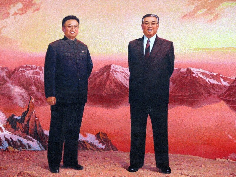 Portrait of two men in suits