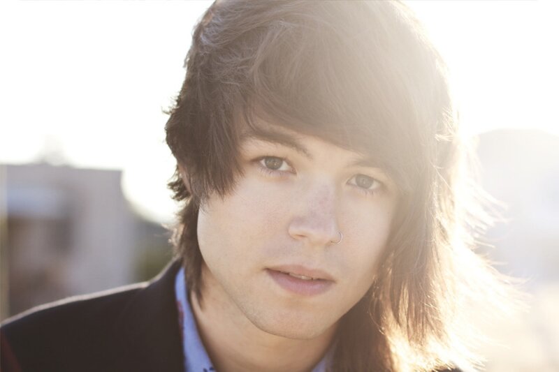 portrait of young man with sunlit hair