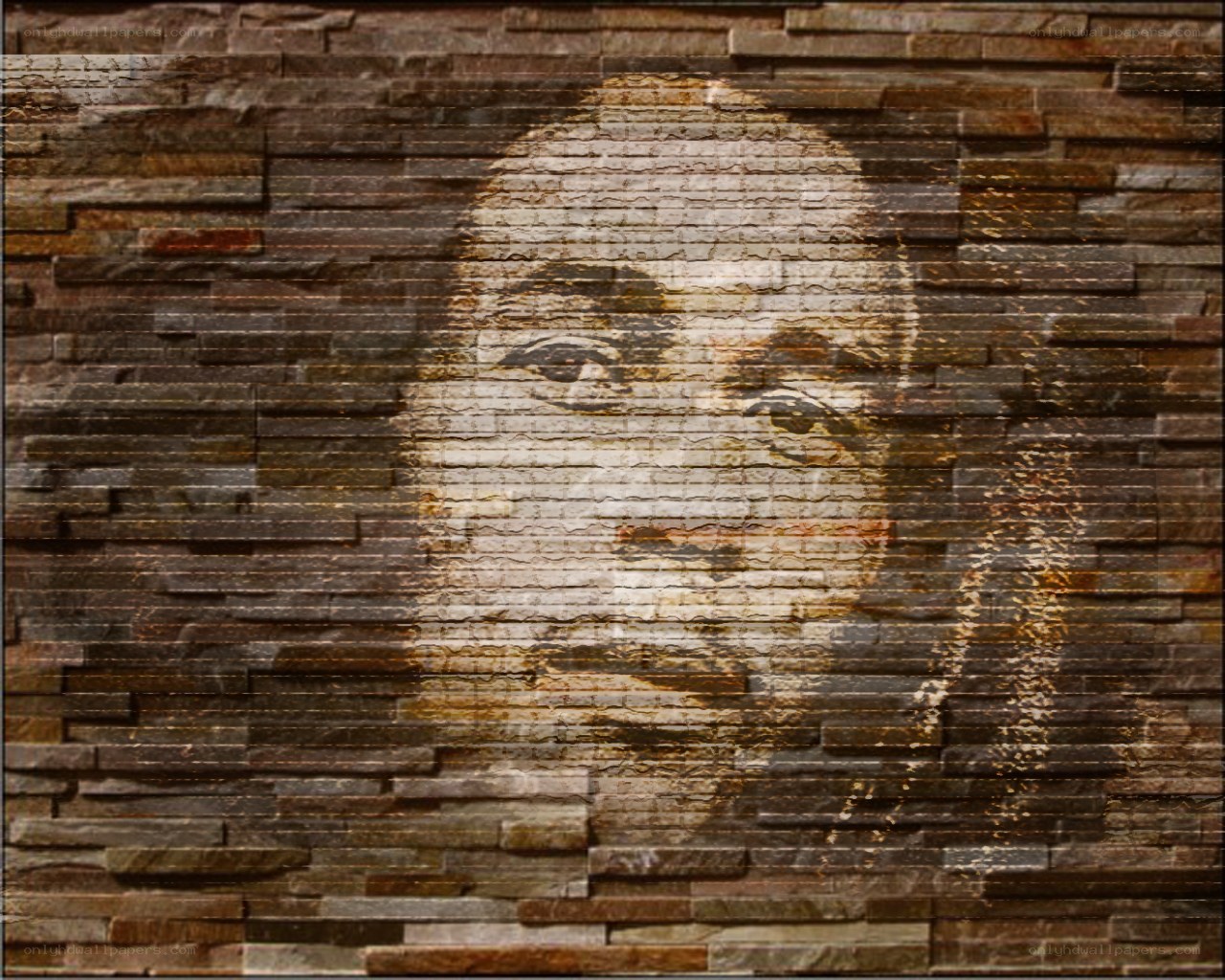 portrait on stone wall