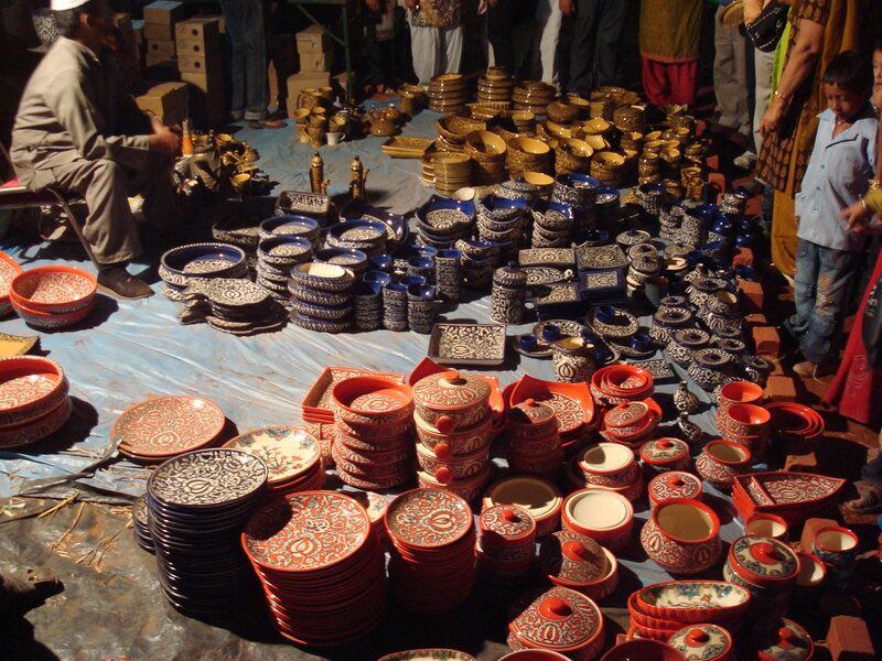 Pottery market stall at night