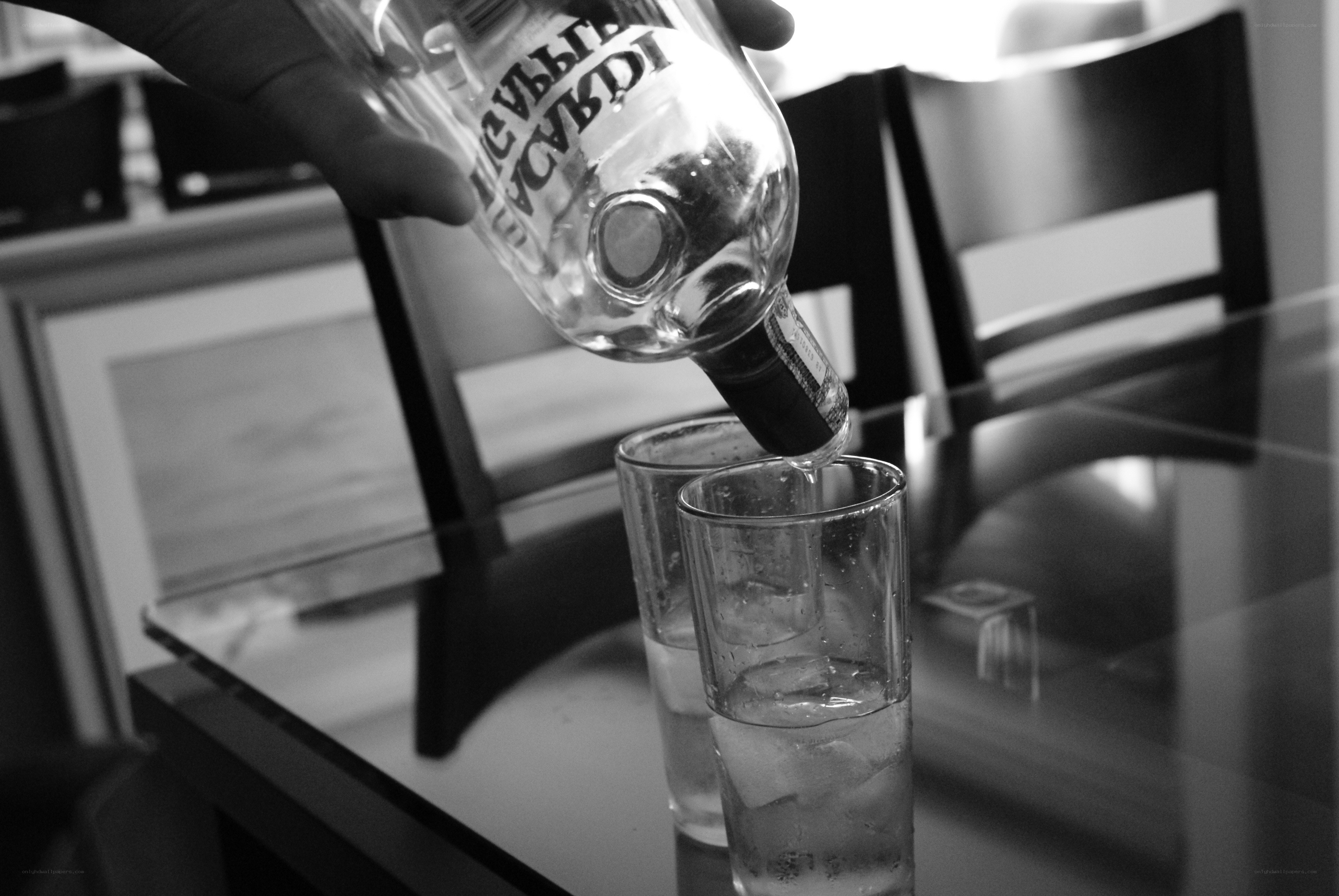 Pouring a drink into glasses