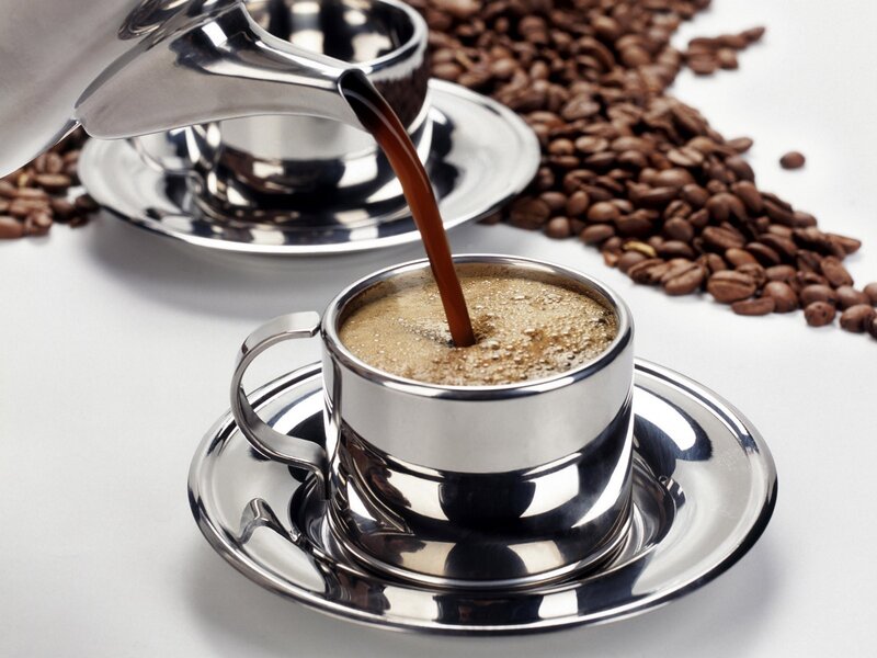 Pouring coffee into a cup