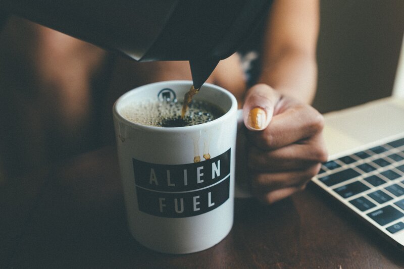 pouring coffee into mug