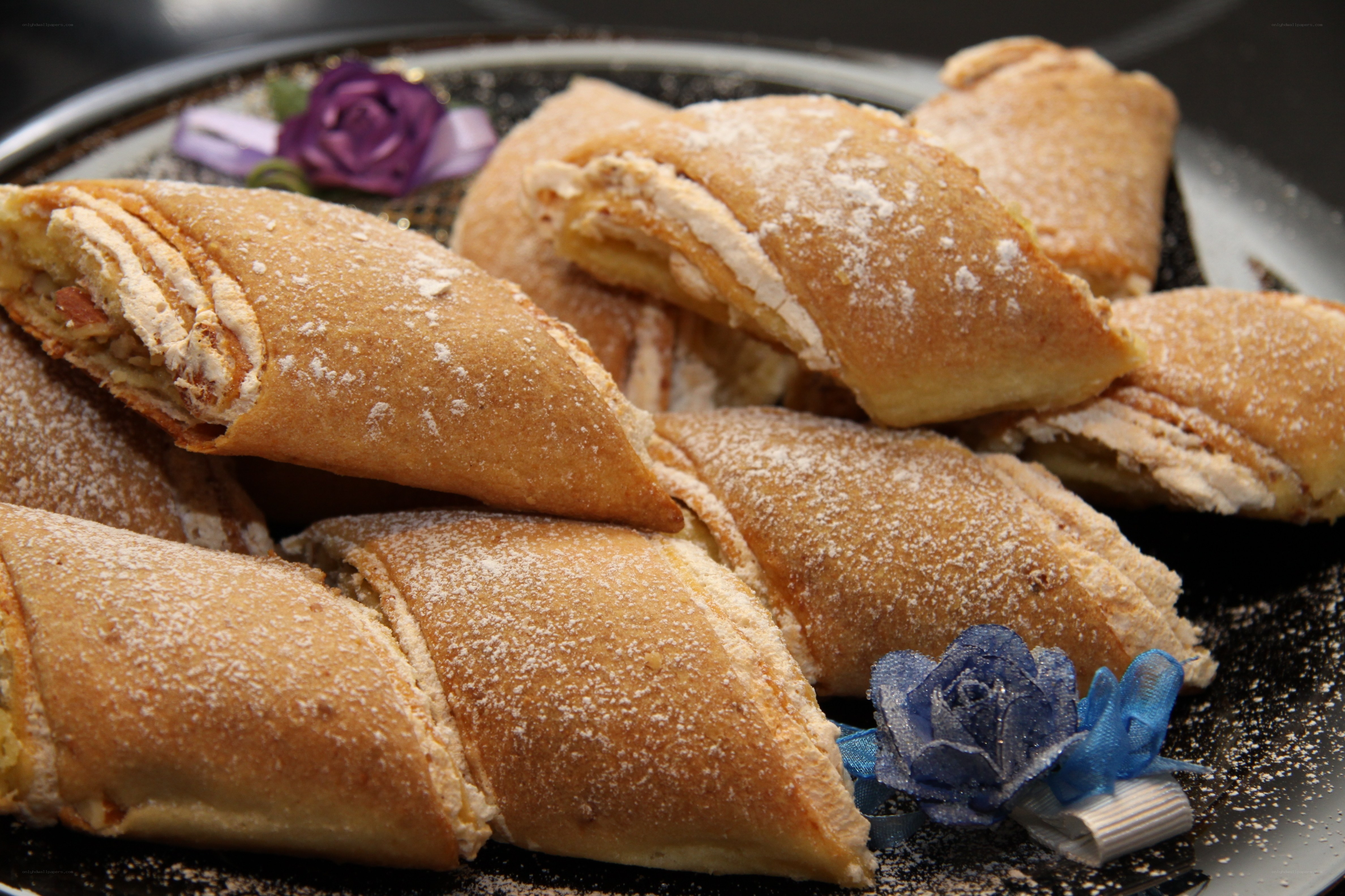 Powdered pastries on a platter