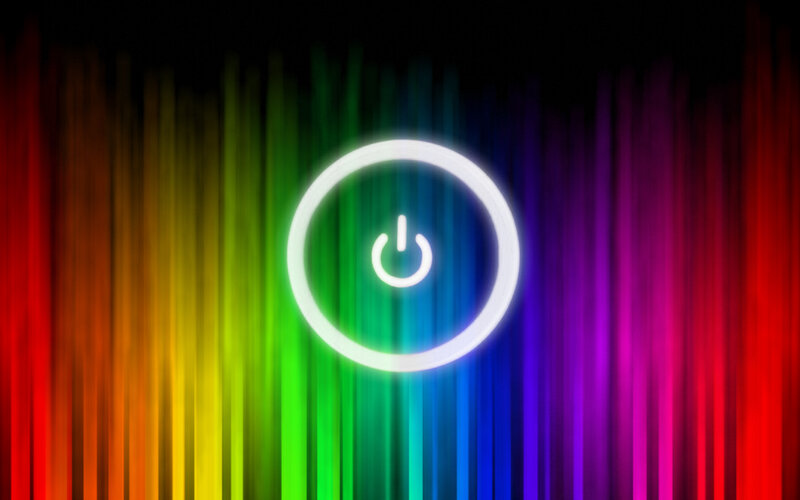 power button on rainbow background