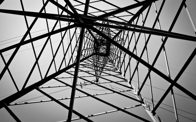 Power line tower from below