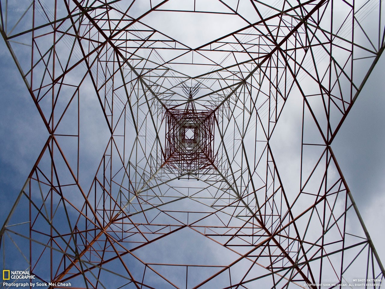 Power line tower from below