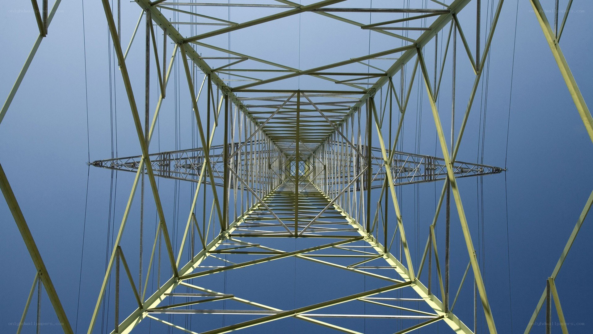 Power line tower from below