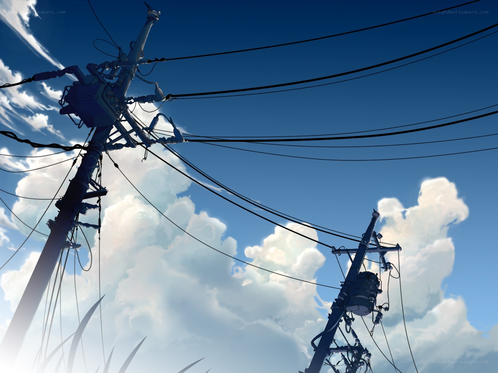Power lines against a blue sky