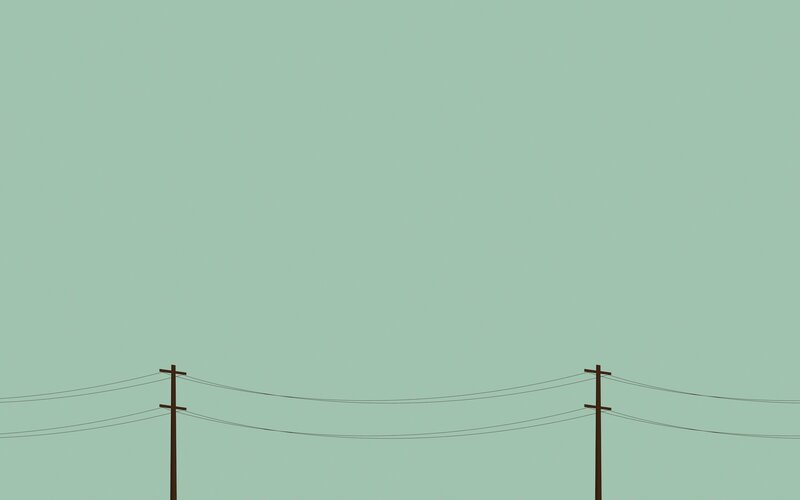 power lines against green sky