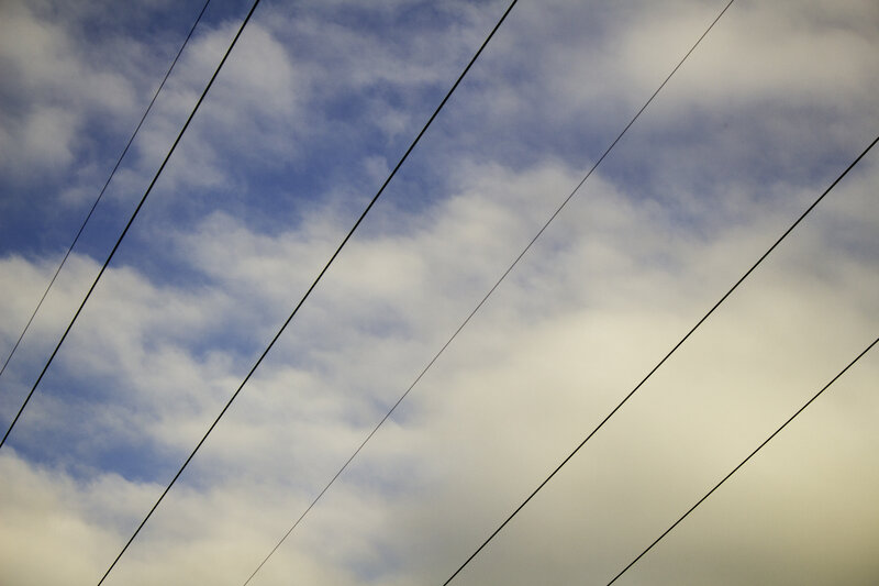Power Lines Against Sky
