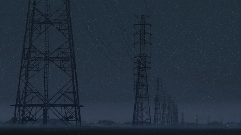 Power lines at night in snow