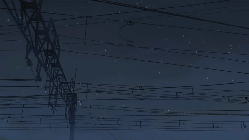 Power lines at night with snow