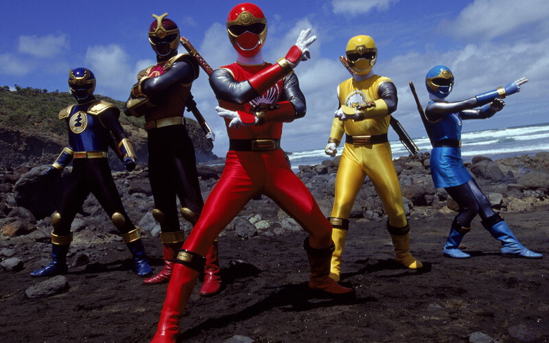 Power Rangers on a rocky beach
