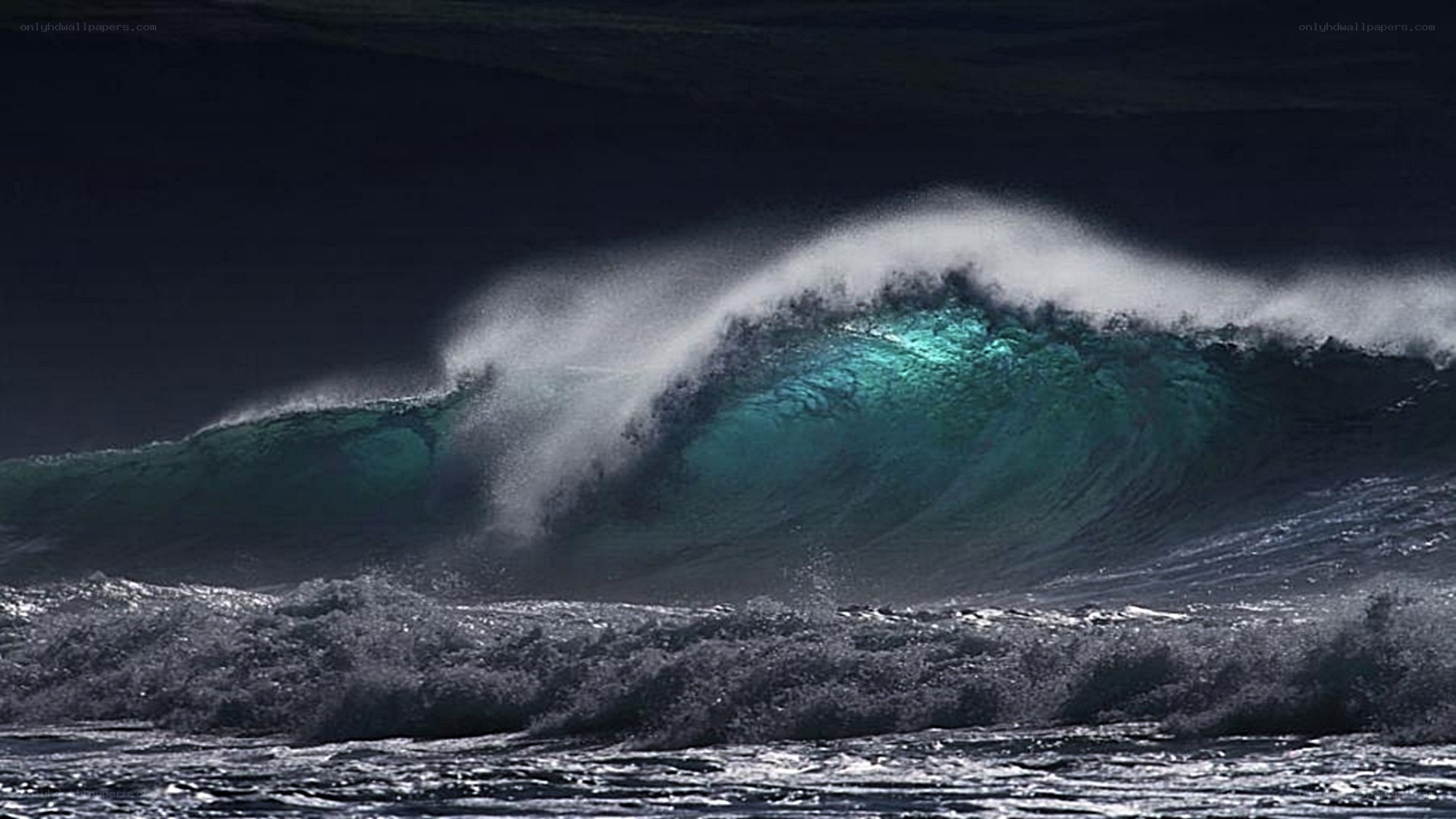 Powerful ocean wave at night