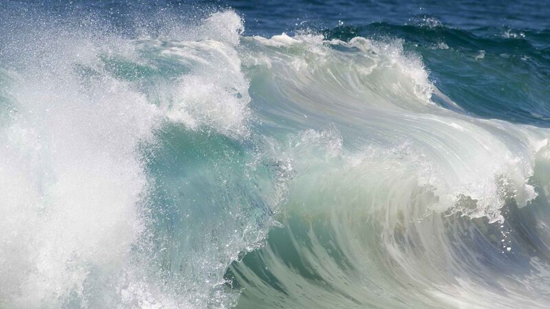 Powerful ocean wave crashing