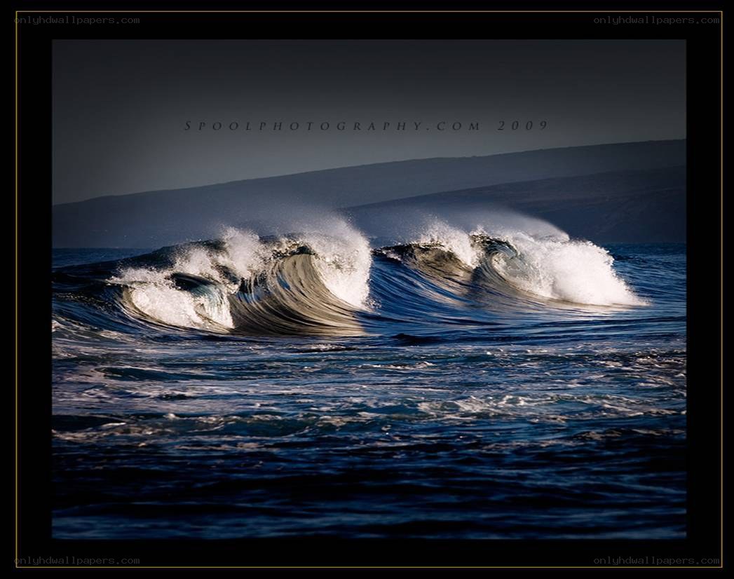 Powerful ocean waves at dusk